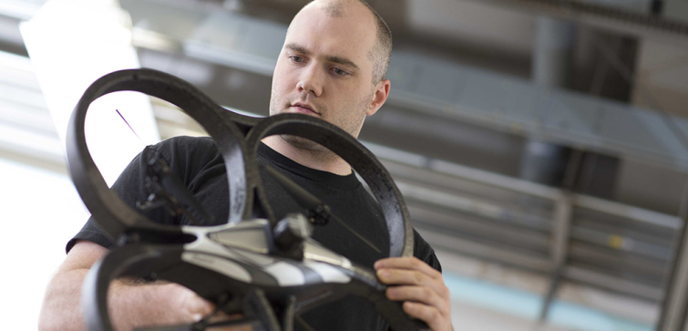 aerospace engineering student working on quadcopter